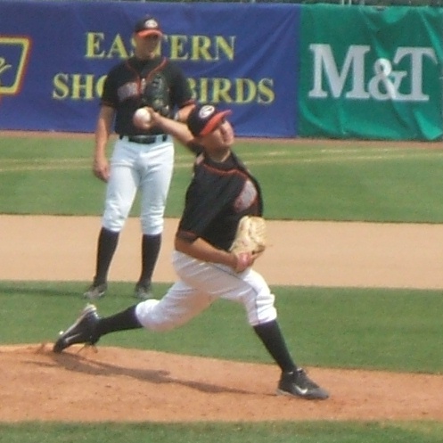Trevor Caughey of the Shorebirds gets warmed up for last Sunday's contest as Mark Fleisher looks on.